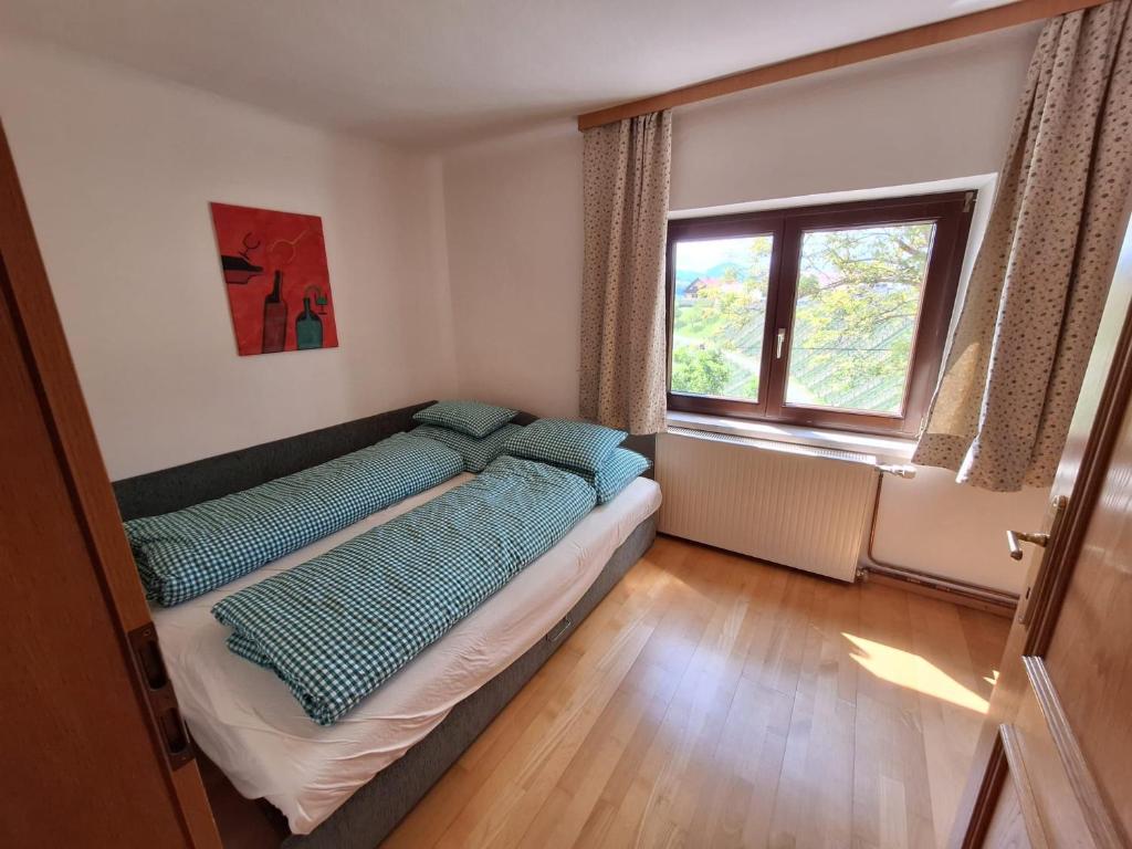 Posteľ alebo postele v izbe v ubytovaní Klein Poschgan