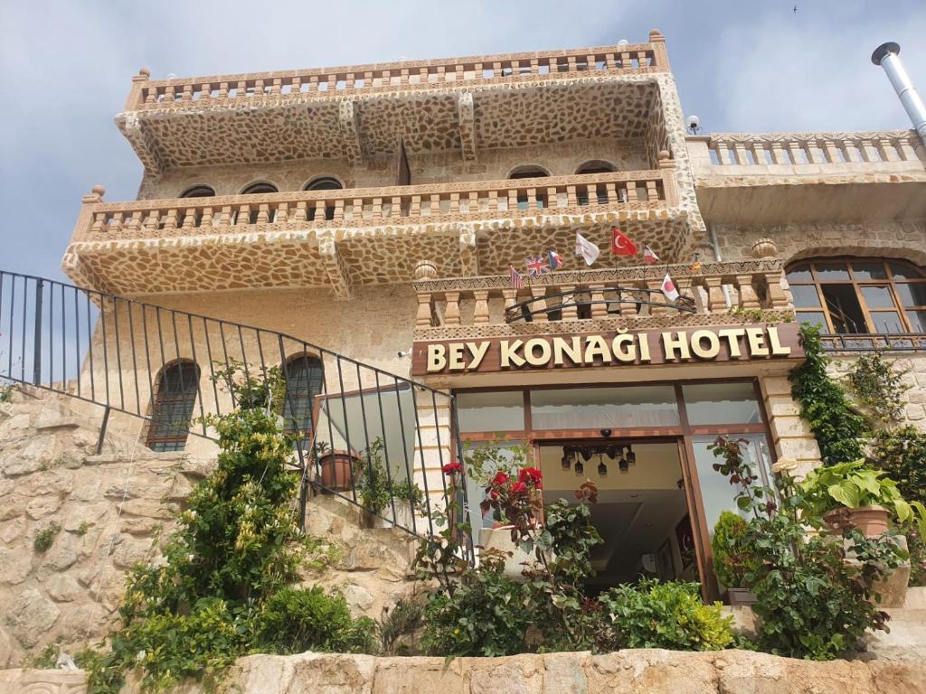 a building with a sign that reads bay korean hotel at Mardin Bey Konağı Hotel in Mardin
