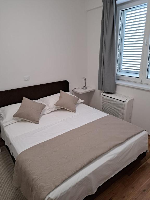 Postel nebo postele na pokoji v ubytování Apartment Rio