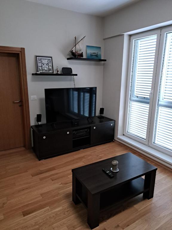 TV a/nebo společenská místnost v ubytování Apartment Rio