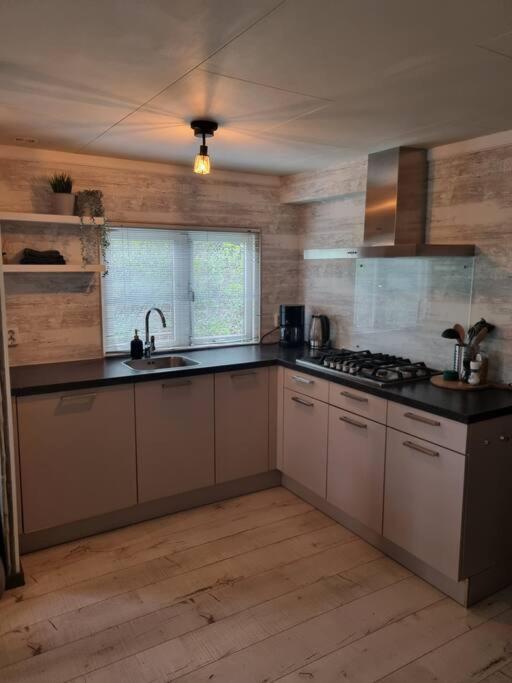Fotografie z fotogalerie ubytování De vier jaargetijden chalet Jungle v destinaci Voorthuizen