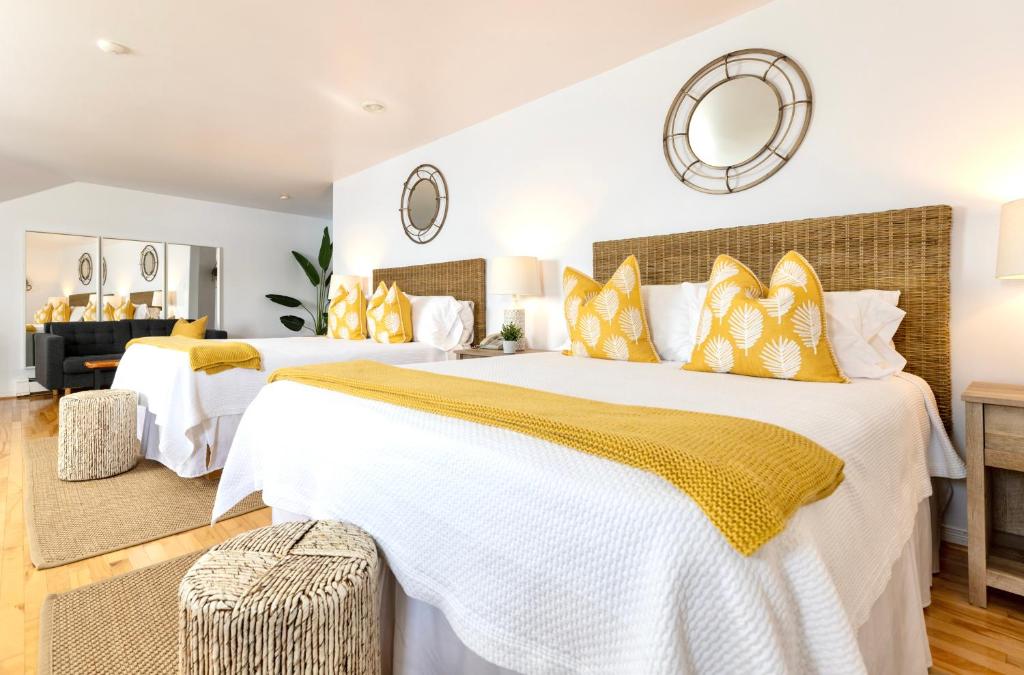 Postel nebo postele na pokoji v ubytování North Star Beach Suites