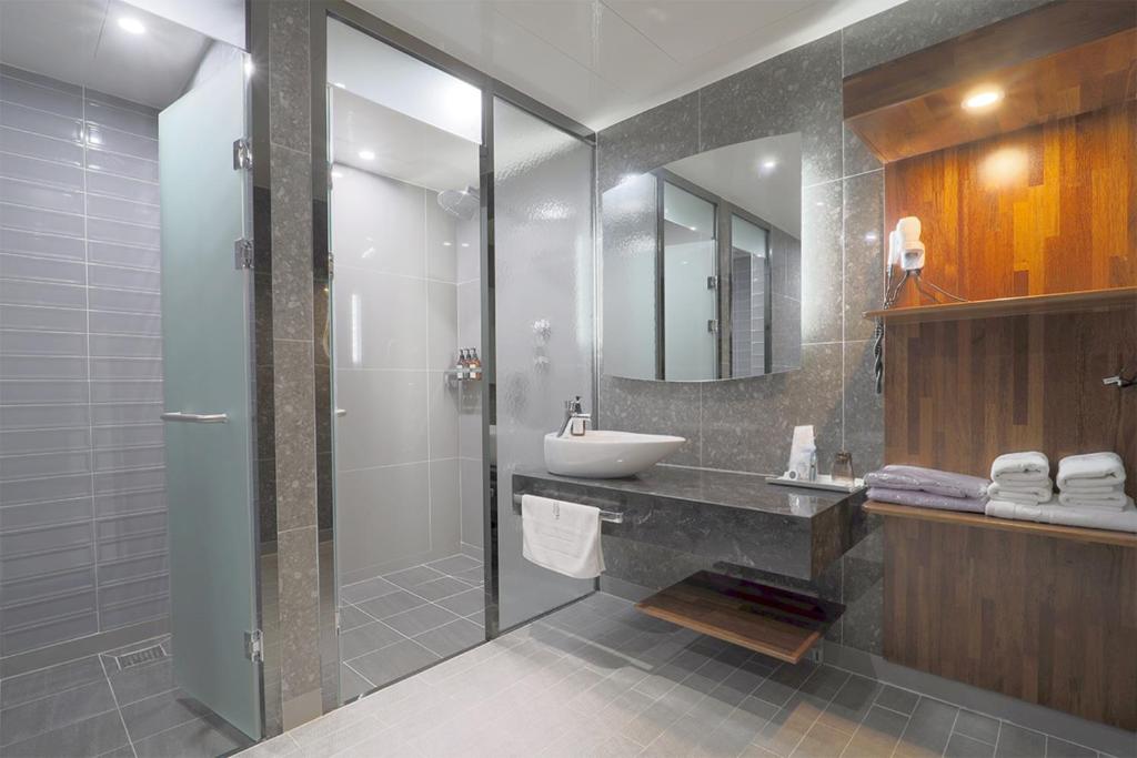 Koupelna v ubytování HOTEL YUNA Business