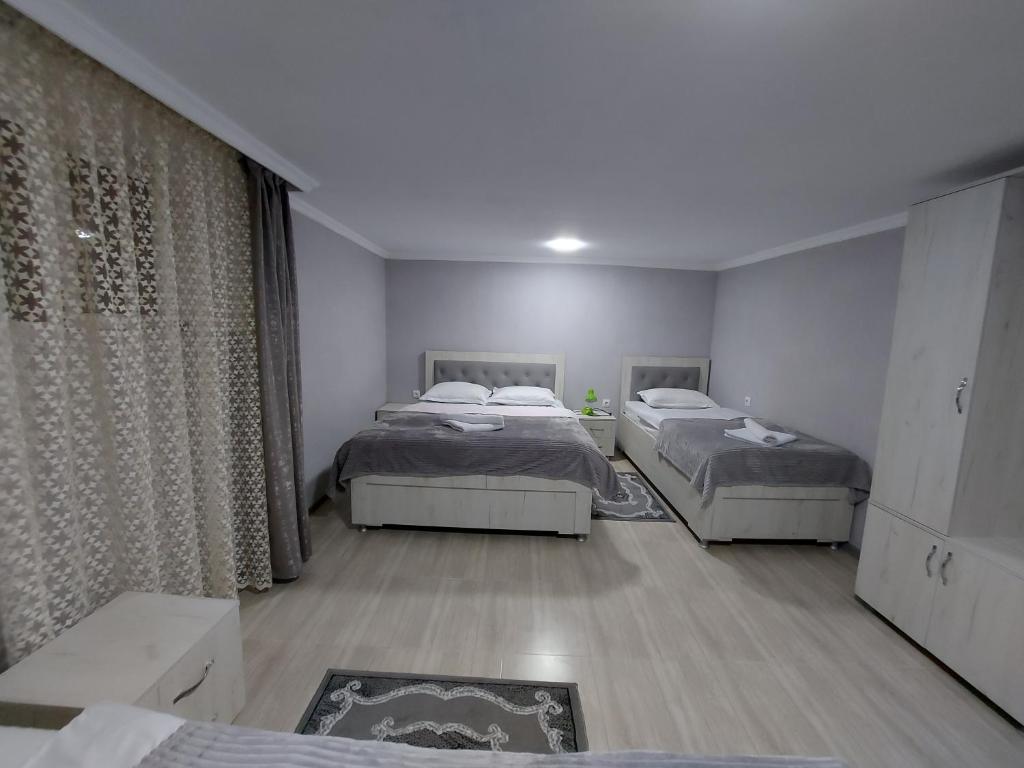 Postel nebo postele na pokoji v ubytování Hotel Rabat Castle