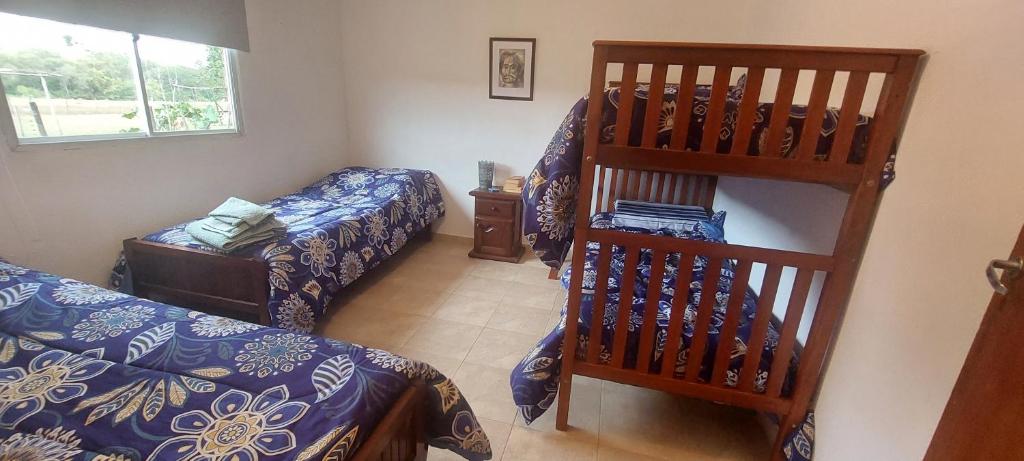 Ένα ή περισσότερα κρεβάτια σε δωμάτιο στο El Descanso