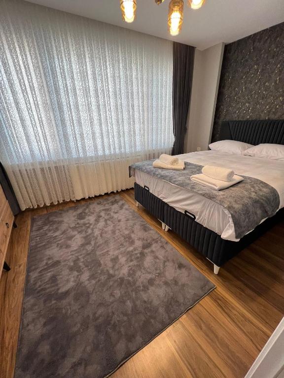 Postel nebo postele na pokoji v ubytování Fatih / Aksaray - Yusufpaşa
