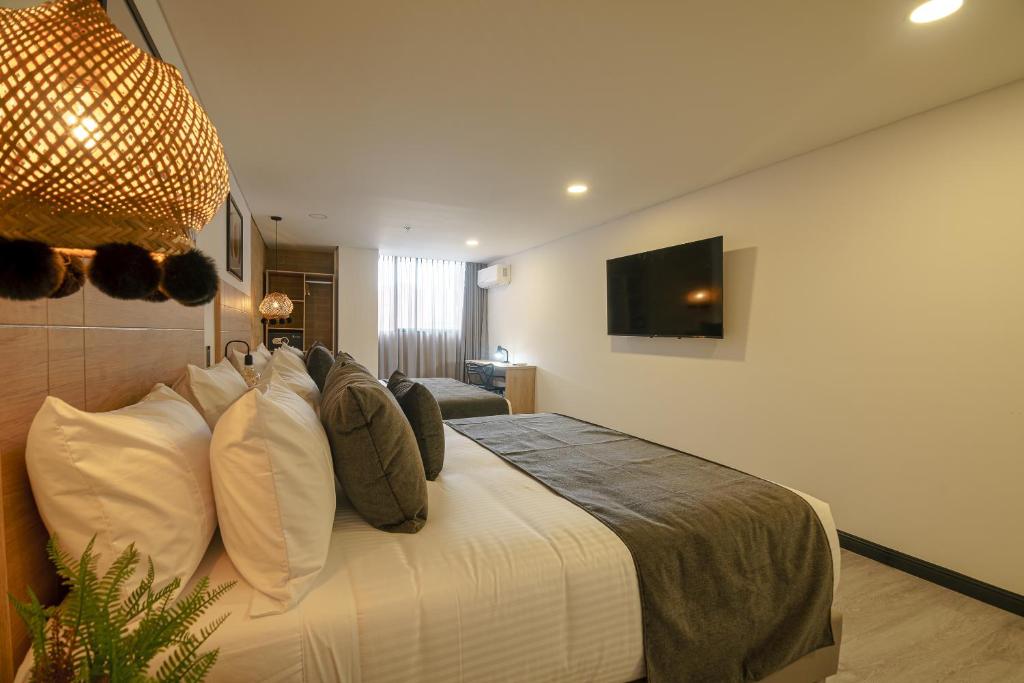 Katil atau katil-katil dalam bilik di First Class Hotel