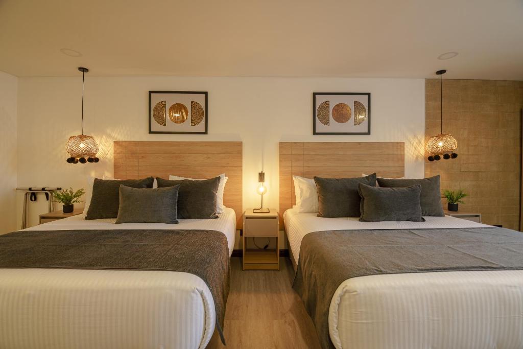Katil atau katil-katil dalam bilik di First Class Hotel