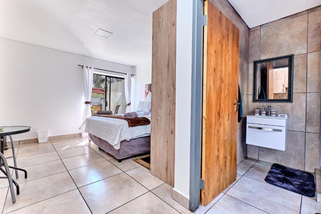 Fotografie z fotogalerie ubytování Bachelor unit with inverter in Sandton v destinaci Johannesburg
