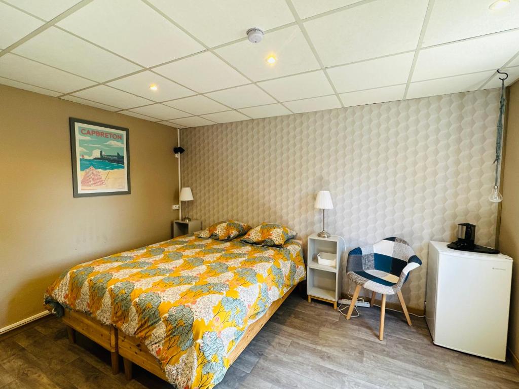 Postel nebo postele na pokoji v ubytování Hotel Caplandes