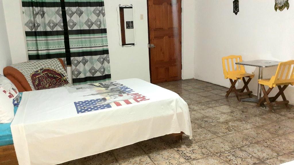 Postel nebo postele na pokoji v ubytování Rooms Palmeras
