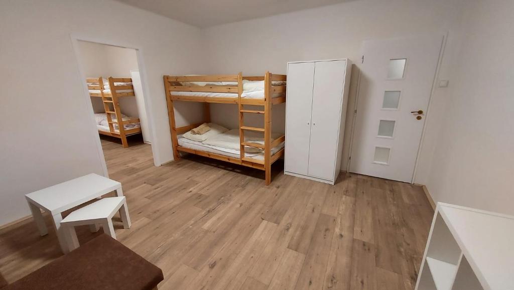 Postel nebo postele na pokoji v ubytování Apartmán Velehrad