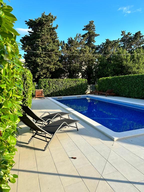 Bazén v ubytovaní Apartments Villa Ohana alebo v jeho blízkosti