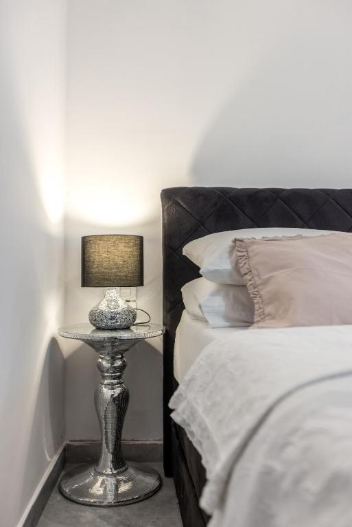 Posteľ alebo postele v izbe v ubytovaní Apartments Milla