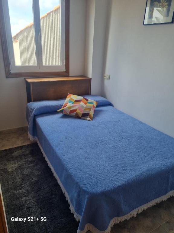 Postel nebo postele na pokoji v ubytování Triplex corral(centro grove)