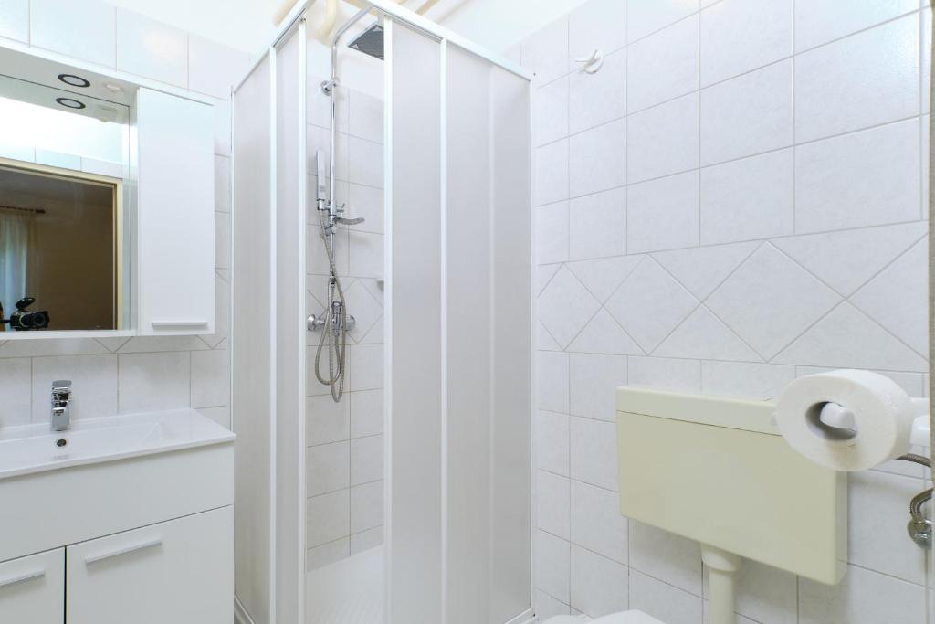 Kúpeľňa v ubytovaní Appartment Ksenija 4