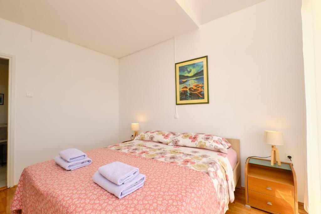 Posteľ alebo postele v izbe v ubytovaní Appartment Ksenija 4