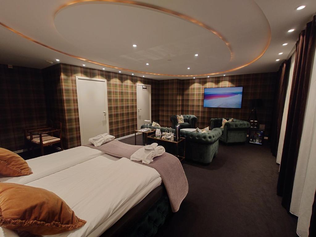 Postel nebo postele na pokoji v ubytování Palace Hotell
