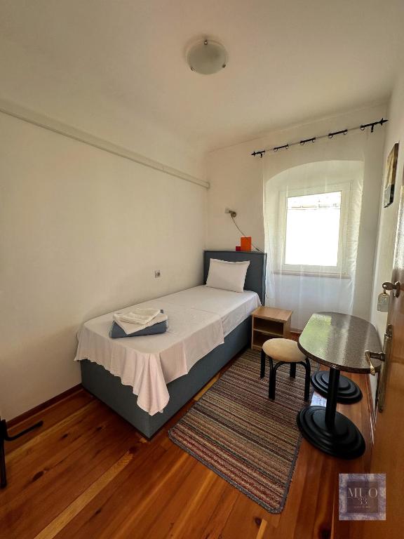 Postel nebo postele na pokoji v ubytování Muo 33 Apartments
