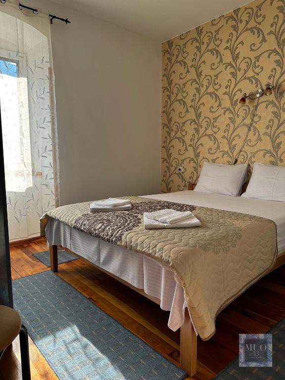 Postel nebo postele na pokoji v ubytování Muo 33 Apartments