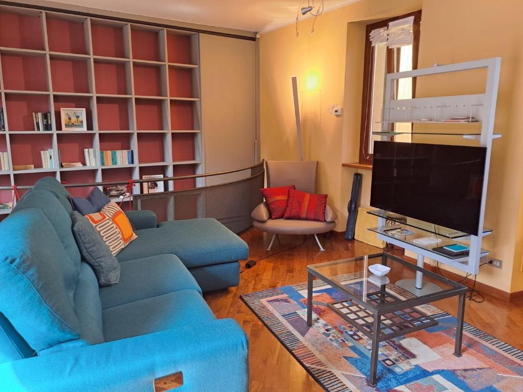 TV a/nebo společenská místnost v ubytování Casa Acquerello
