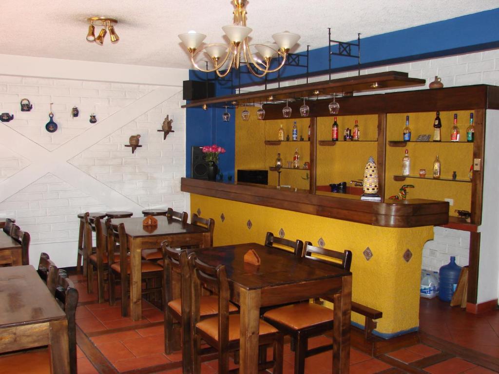 Lounge nebo bar v ubytování Apartamentos Los Quipus