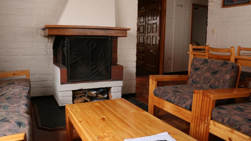 Posezení v ubytování Apartamentos Los Quipus