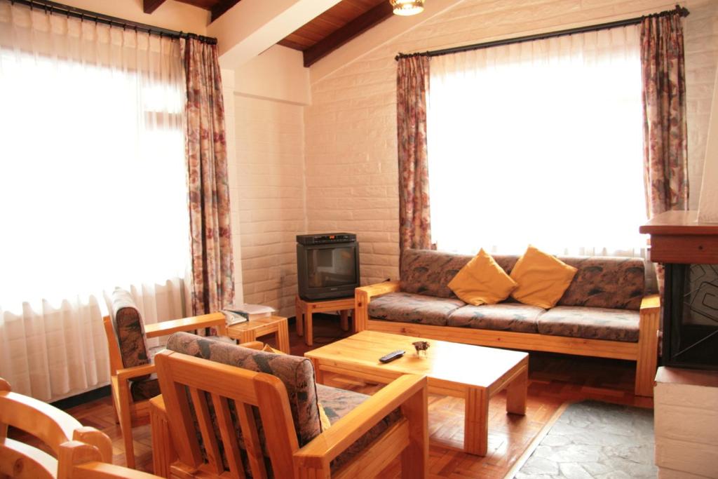 Posezení v ubytování Apartamentos Los Quipus