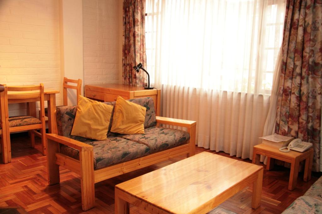 Posezení v ubytování Apartamentos Los Quipus