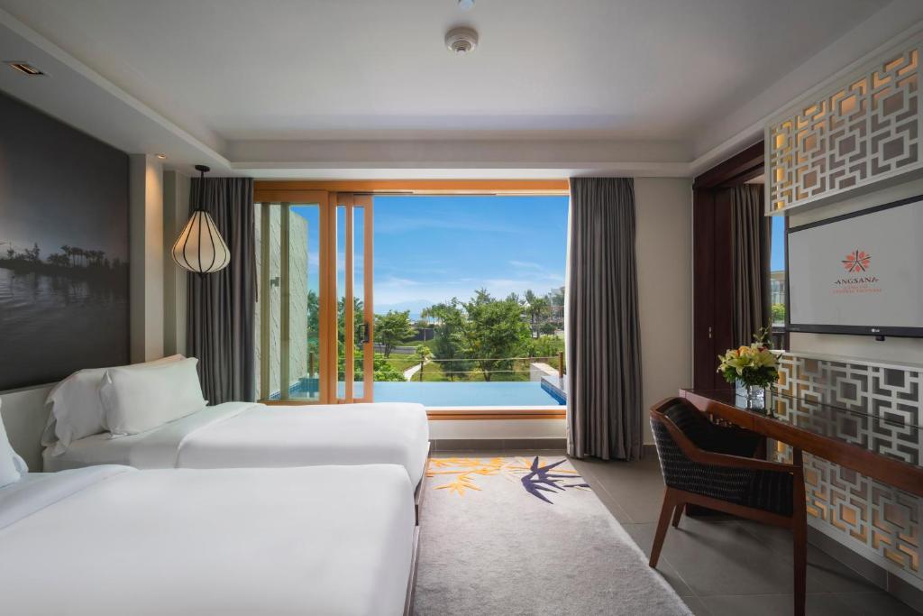 Suite Junior 2 Giường Đơn Có Hồ Bơi Riêng Nhìn Ra Biển