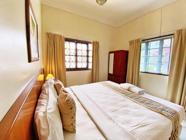 Letto o letti in una camera di Tiara Labuan Hotel