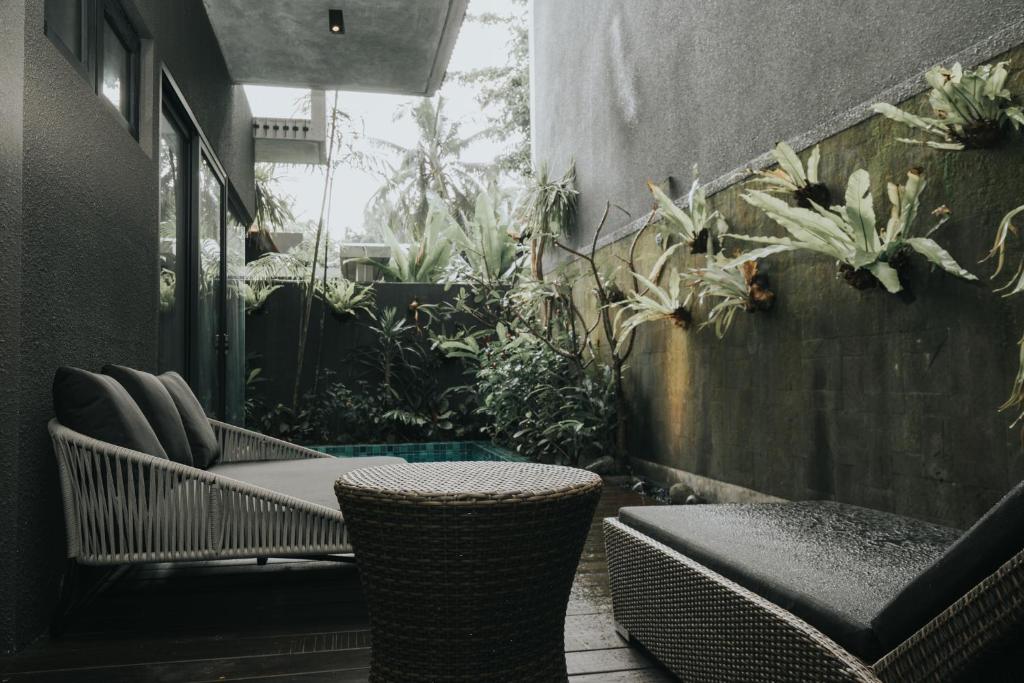 Posezení v ubytování The Ning Resort Ubud