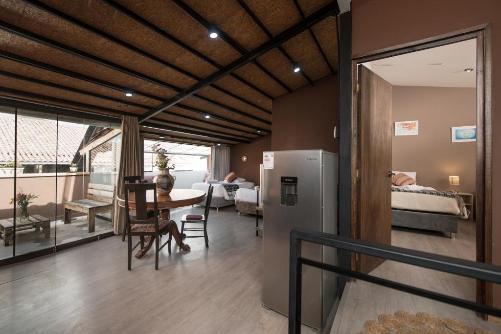 Postel nebo postele na pokoji v ubytování Casa Cavassa Centro Histórico Cusco