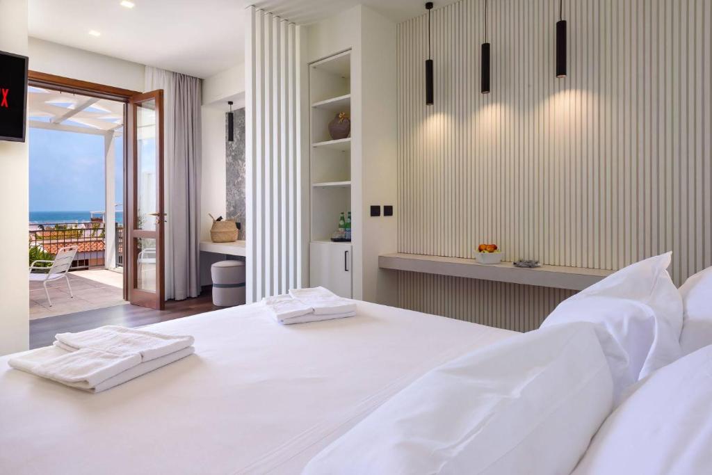 Ein Bett oder Betten in einem Zimmer der Unterkunft Albergo Auralba