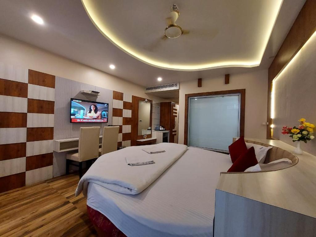 Postel nebo postele na pokoji v ubytování New Gitanjali Hotel, New Digha