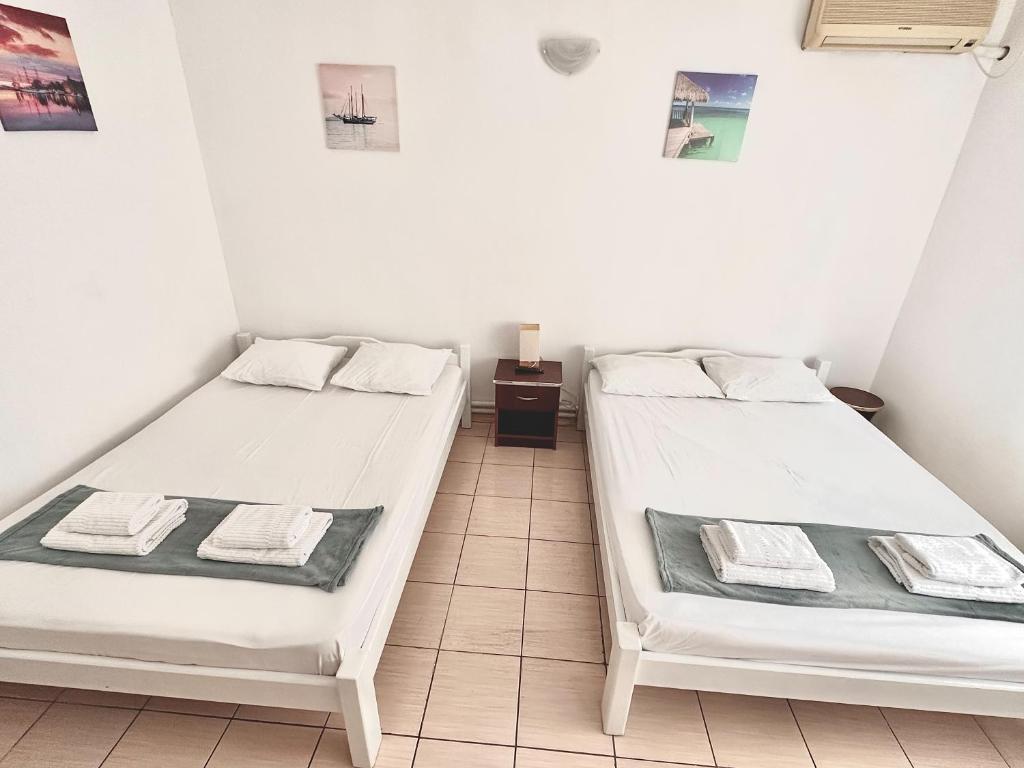 Postel nebo postele na pokoji v ubytování Casa Tin Ultracentral Costinesti