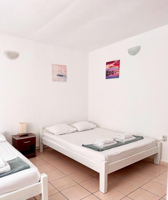 Postel nebo postele na pokoji v ubytování Casa Tin Ultracentral Costinesti