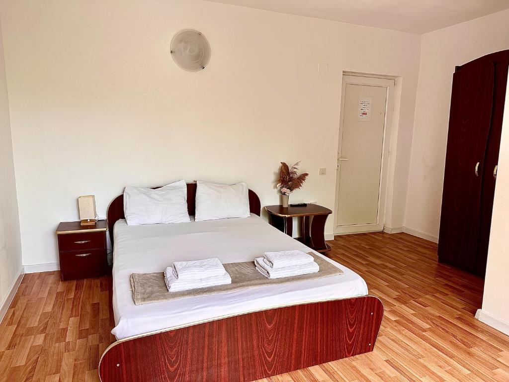 Postel nebo postele na pokoji v ubytování Casa Tin Ultracentral Costinesti