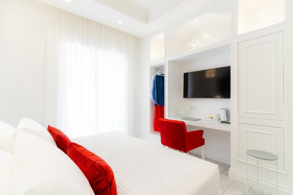 TV a/nebo společenská místnost v ubytování L'INCANTO DI CIOFFI ROOMS