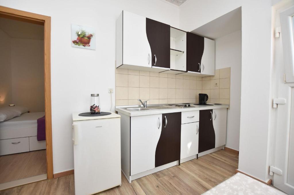 Kuchyňa alebo kuchynka v ubytovaní Apartments ATM