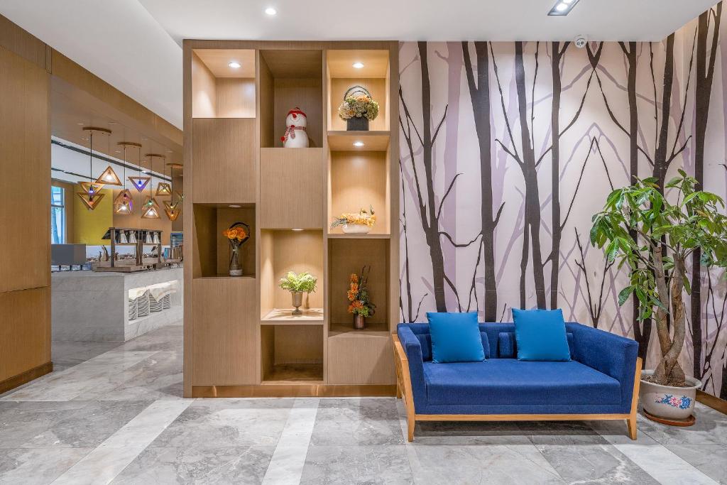 Posezení v ubytování Guangzhou Baiyun Airport Rejoice by Argyle Hotel Rehe Metro Exit B --Free shuttle bus is provided during the 137th Canton Fair