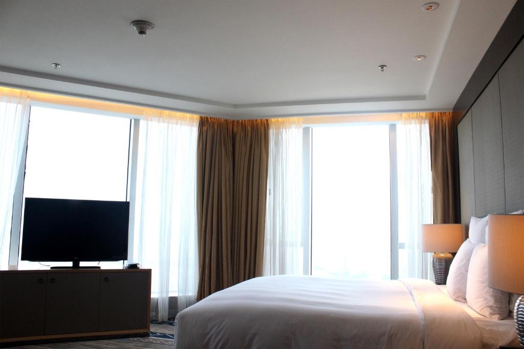 TV a/nebo společenská místnost v ubytování Renaissance Huizhou Hotel