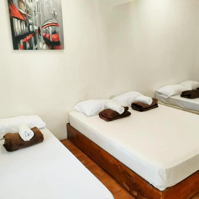 Postel nebo postele na pokoji v ubytování Siargao Tropic Hostel