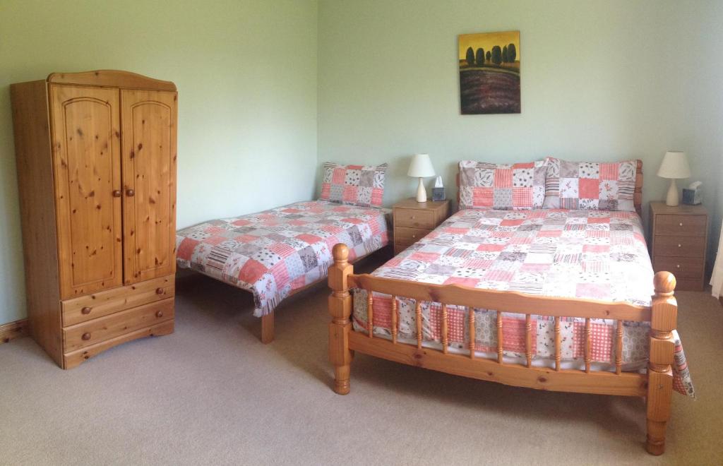 Postel nebo postele na pokoji v ubytování Amber B&B