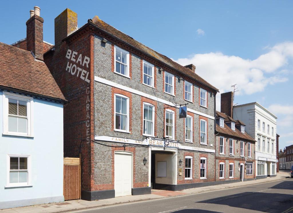 an old brick building on the side of a street at Bear Hotel by Greene King Inns in Havant