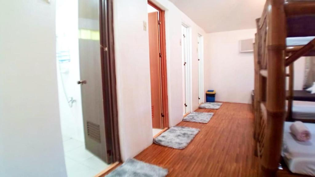 Postel nebo postele na pokoji v ubytování Siargao Tropic Hostel