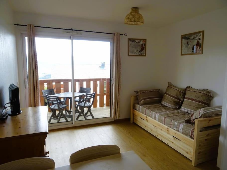 Posezení v ubytování Bel appartement - superbe vue - piscine