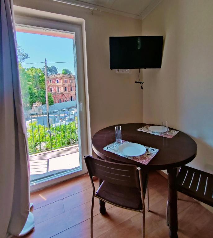 TV a/nebo společenská místnost v ubytování Angelos Apartment Corfu