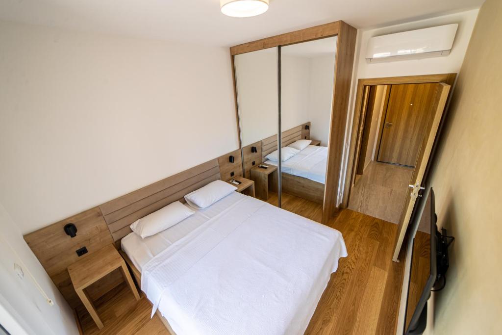 Postel nebo postele na pokoji v ubytování Apart Kraft
