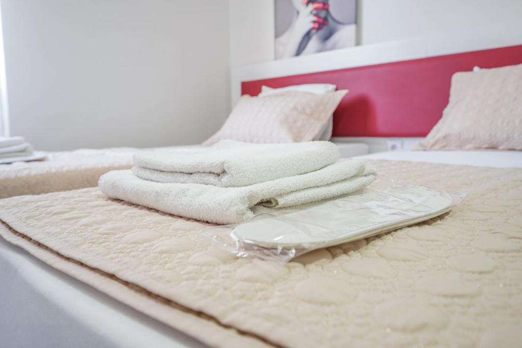 Postel nebo postele na pokoji v ubytování YAŞAM HOTEL